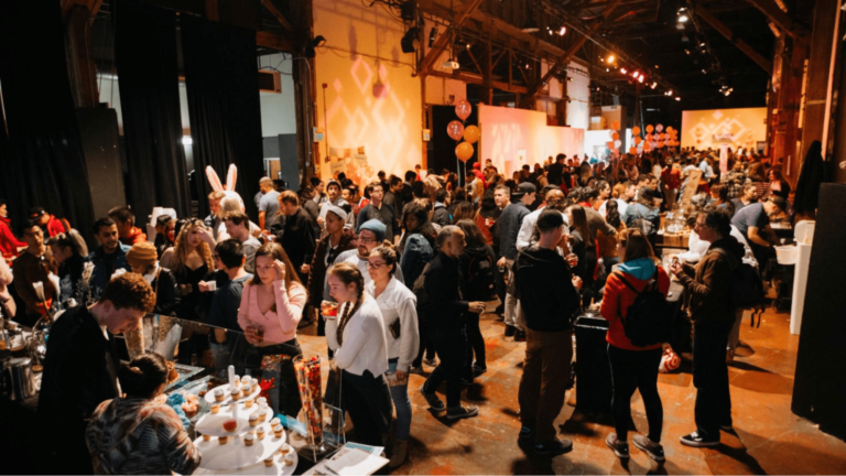 Crowd of people at indoor food event